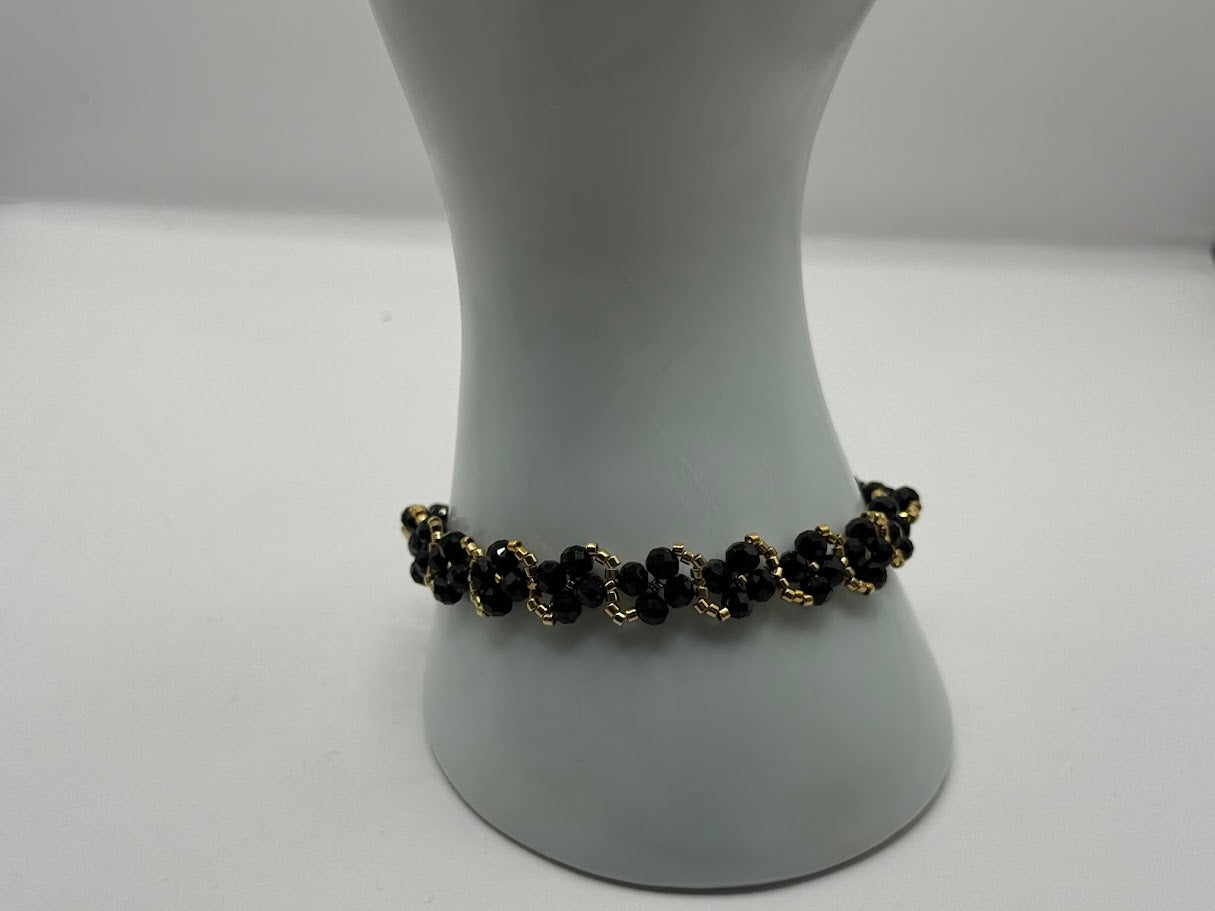 Perlenarmband Schwarz-Gold